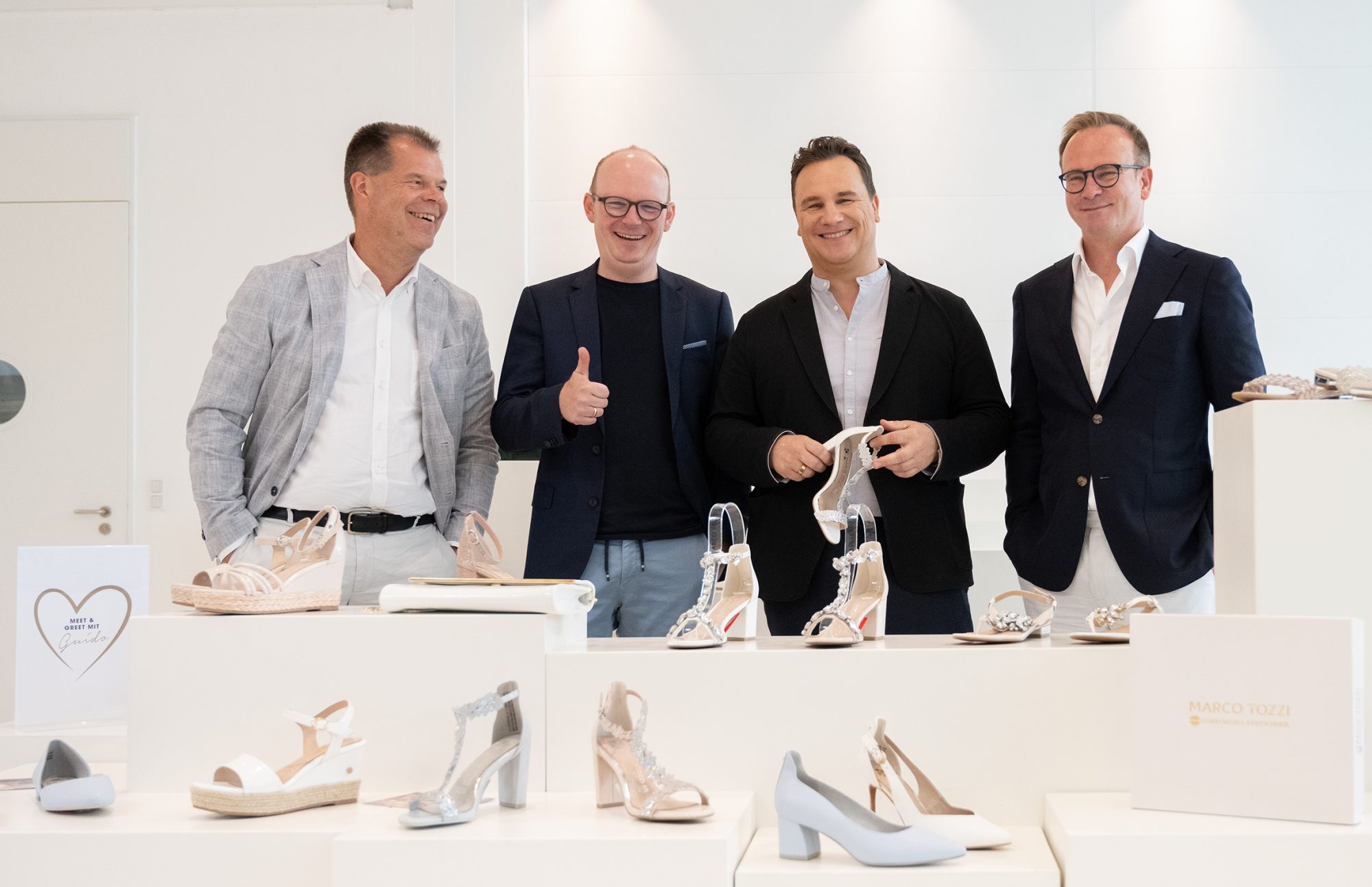 Carsten Humke (Geschäftsführender Gesellschafter MARCO TOZZI), Christian Böhm (Geschäftsführer Vertrieb & Marketing MARCO TOZZI) , Guido Maria Kretschmer, Jens Beining (CEO Wortmann Gruppe) (Foto: Wortmann Gruppe)